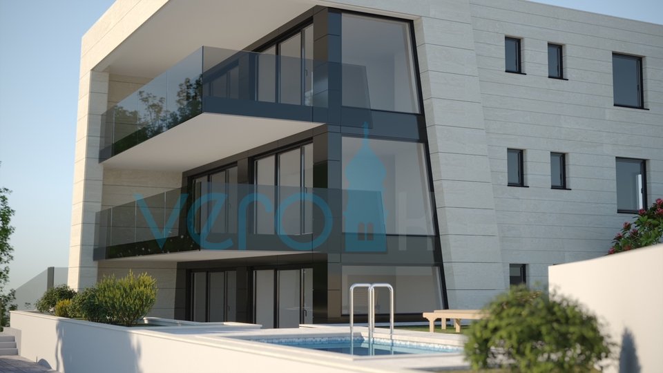 Malinska, appartamento con tre camere da letto in un nuovo edificio con piscina e giardino a 80 metri dal mare