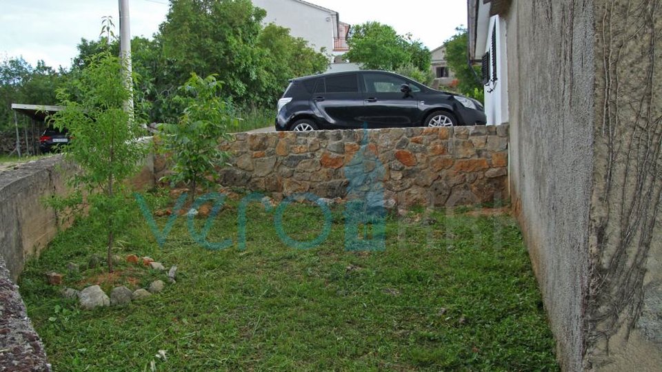 The town of Krk, surroundings, autochthonous old stone house with a large garden